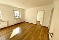 Herrlich sanierte Erdgeschosswohnung mit moderner Wohnküche, stilvollem Badezimmer und Grünblick - in ruhiger Siedlungslage mit ausgezeichneter Infrastruktur, ideal für kleine Familien!