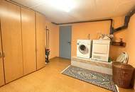 Sonniges Einfamilienhaus mit gepflegtem Garten, Terrasse, Balkon und Doppelgarage
