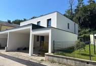 Neu gebaute Doppelhaushälfte mit großem 3fachcarport in beliebter Siedlung