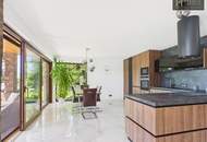 An Exceptional Waterfront Retreat with Private Beach and Unrivaled Privacy