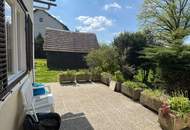 Einfamilienhaus mit viel Platz, sonnigem Garten, Terrasse und Nebengebäude!