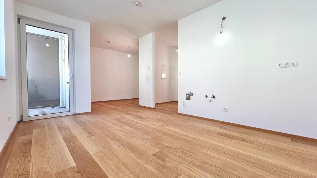 Erstbezug – 2-Zimmer-Charakter-Wohnung mit Loggia, Luft-Wärmepumpe & PV-Anlage