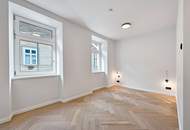 Altbau-Erstbezug mit hofseitigem Balkon im 2. Liftstock einer sanierten Liegenschaft! Fernwärme!