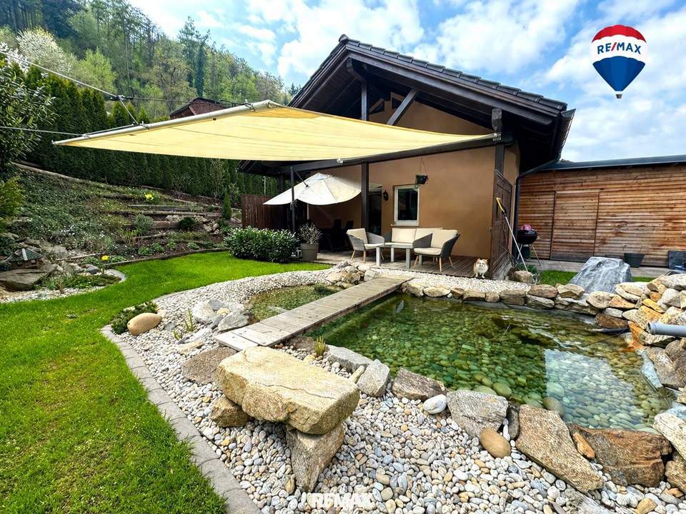 Ihr kleines Wohnparadies: Neuwertiger Bungalow mit Garten und Carport