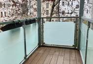 Elegante 3-Zimmerwohnung mit Balkon in saniertem Altbau