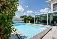 **Private Wohlfühloase mit Pool, Wintergarten & unverbaubaren Blick ins Grüne**