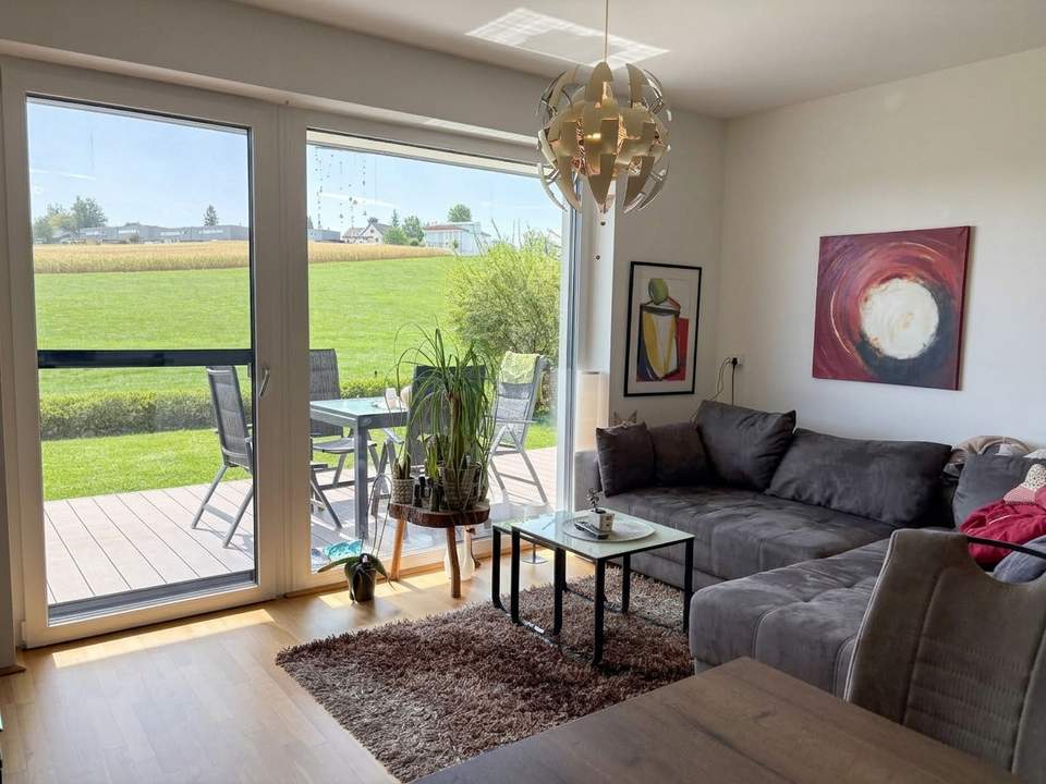 Moderne Gartenwohnung in schöner Wohnlage mit 2 KFZ-Stellplätzen