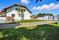 High-end living in a peaceful green location! A feel-good retreat in a class of its own: tradition meets state-of-the-art comfort!