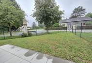 Neuwertige Mietwohnung im EG mit Garten, Garage und Parkplatz