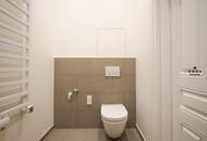 Erstbezug nach Generalsanierung - Elegantes Apartment mit optimaler Nahverkehrsanbindung