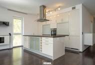 Exklusive 4-Zimmer Maisonettewohnung mit einer 100 m² großen Dachterrasse und zwei Tiefgaragenstellplätzen in TOP-Lage!