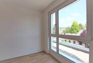 Luxus in Strebersdorf: Dachgeschoßwohnung mit großer Hofterrasse und Klimaanlage im Niedrigenergiehaus mit Fitnessraum!