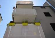 Exklusive 2‑Zimmer‑DG‑Wohnung mit sonniger Hofterrasse und Weitblick über Wien