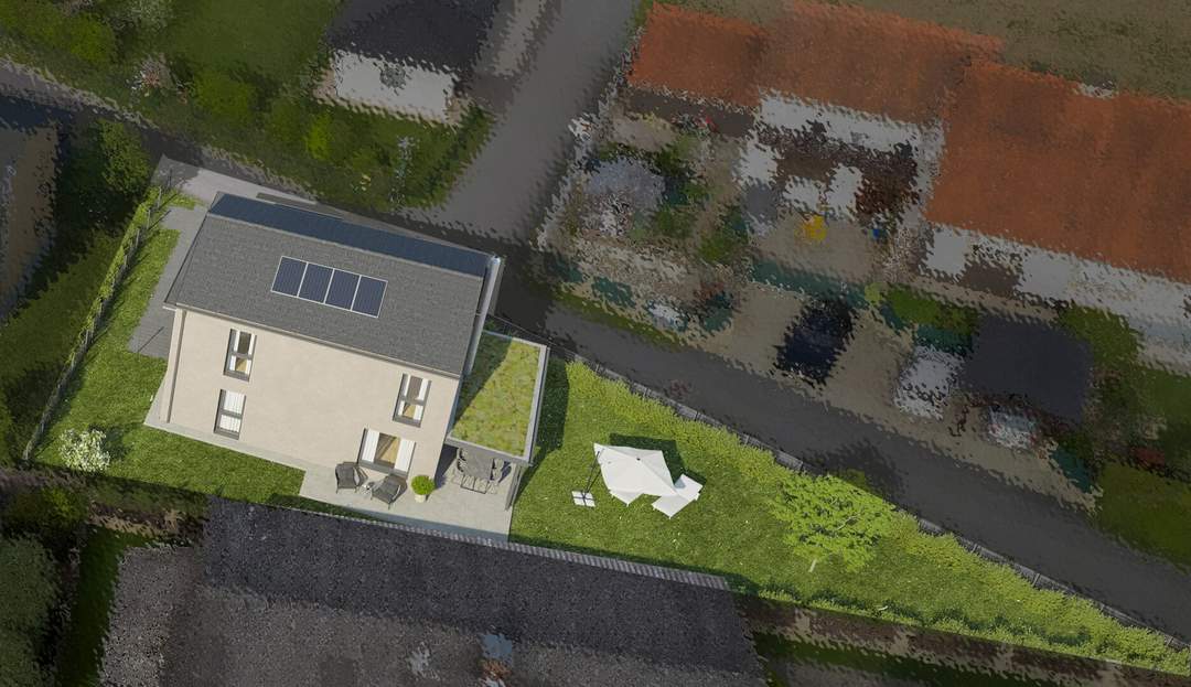 Neubau- Wohnhaus in sehr guter Lage mit Terrasse und Garten sowie zwei Carports