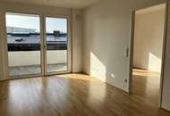 EXKLUSIVER ERSTBEZUG nahe Hauptbahnhof - Sonnige Wohnung mit großzügiger Freifläche und Küche in einem modernen Neubauprojekt