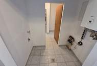 Barrierefreie Zweizimmerwohnung mit Eigengarten und Tiefgaragenstellplatz!