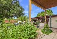 Entzückendes Zweifamilienhaus mit Pool, traumhaftem Garten und Garage in toller Lage in Tribuswinkel zu kaufen!