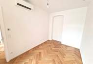 ***Altbau trifft Moderne – hochwertig sanierte 3-Zimmer-Wohnung mit Klimaanlage, Luftwärmepumpe, hofseitiger Terrasse &amp; edler Ausstattung***