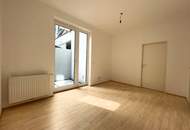 Erdgeschoß, barrierefrei, Innenhof! Ruhige, loft-artige Neubauwohnung mit 2 kl. Terrassen