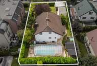 "Charmantes Einfamilienhaus mit Pool, großem Garten und modernem Wohnkomfort"