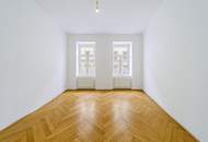 4-Zimmer-Altbauwohnung mit Balkon und Fischgrätparkett in ruhiger Innenhoflage