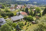 Gartenparadies in einzigartiger Naturlage: Gemütlicher Bungalow mit Wintergarten direkt an der Drau in Lavamünd