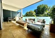 Hugerburg: Loftartige Designerwohnung mit Terrasse und Tiefgaragenstellplatz