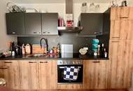 Klassische 2-Zimmer-Wohnung mit großem Balkon - verfügbar ab April 2026