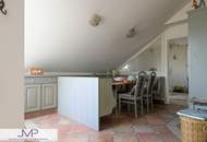 Großzügige DG Wohnung mit 2 ruhigen Südterrassen in zentraler Lage