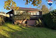 Sanierungsbedürftiges Einfamilienhaus mit großzügiger Terrasse und schönem Baumgarten