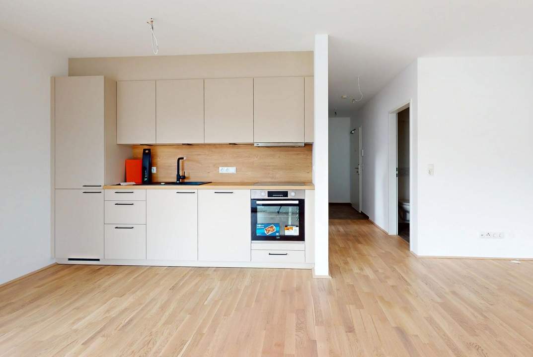 VERMIETET!!! Erstbezug: 2-Zimmerwohnung mit Garagenplatz und Bergblick!