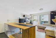 Grenznah wohnen: Moderne Terrassenwohnung für Pendler und Genießer