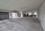 Mehrfamilienhaus mit Geschäftslokal