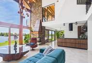 An Exceptional Waterfront Retreat with Private Beach and Unrivaled Privacy