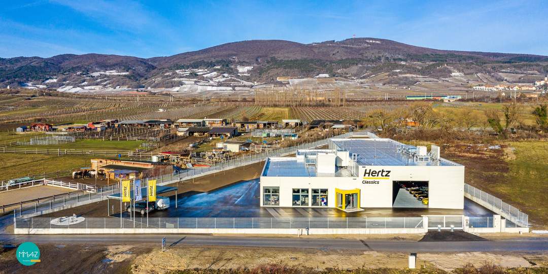 STATEMENT PROPERTY I Showroom • Lagerflächen • Büros • Garage• Dachterrasse mit unverbaubarem Fernblick! Raum für Visionen!