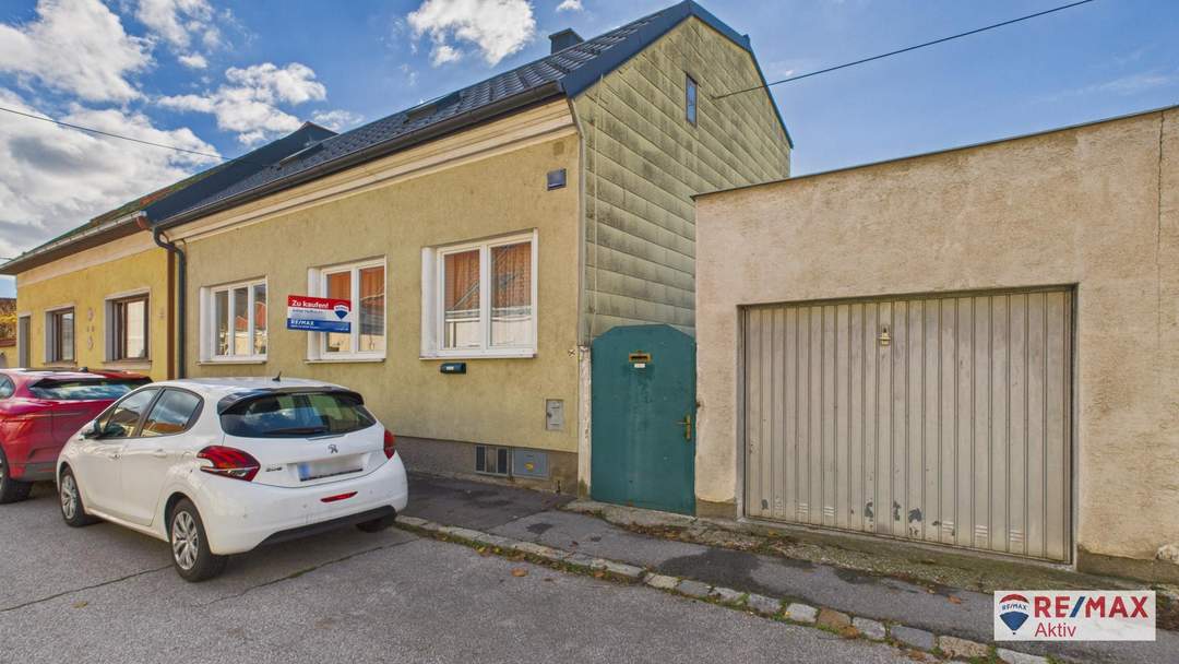 Gepflegtes Haus mit Garten, Garage & Nebengebäuden