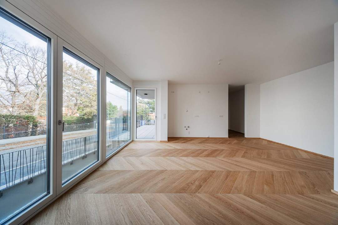 Stock im Weg - Elegante Gartenwohnung mit großzügigem Balkon