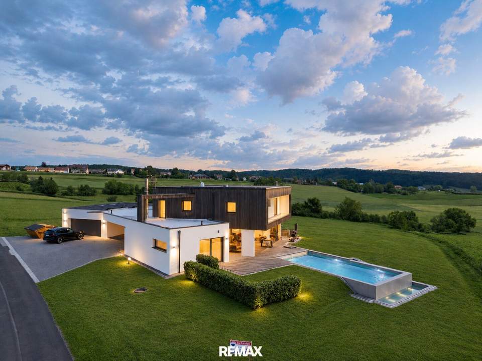 Ein Leben mit Weitblick – exklusives Architektenhaus mit Infinity-Pool und einzigartigem Burgpanorama