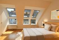 Helle Dachgeschosswohnung mit Charme und viel Freifläche