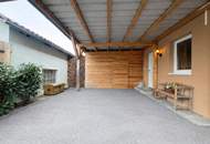 Ihr kleines Wohnparadies: Neuwertiger Bungalow mit Garten und Carport