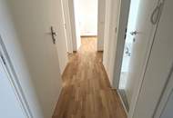 Moderner Rückzugsort für Familien & Naturfans: helle Wohnküche, 3 Schlafzimmer und ein hochwertiges Bad vereinen Komfort, Stil und urbanes Lebensgefühl auf kompaktem Raum!