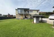 Wunderschönes Zweifamilienhaus mit großzügigem Garten und erstklassiger Ausstattung