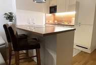 Urban und Grün mit 85 m² Gesamtnutzfläche: Ruhige Neubau-Gartenwohnung und Tiefgarage – Nur 5 Gehminuten zur U6-Station