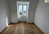 Lichtdurchflutete 3-Zimmer-Wohnung mit neuem Parkettboden, Grünblick und Garage