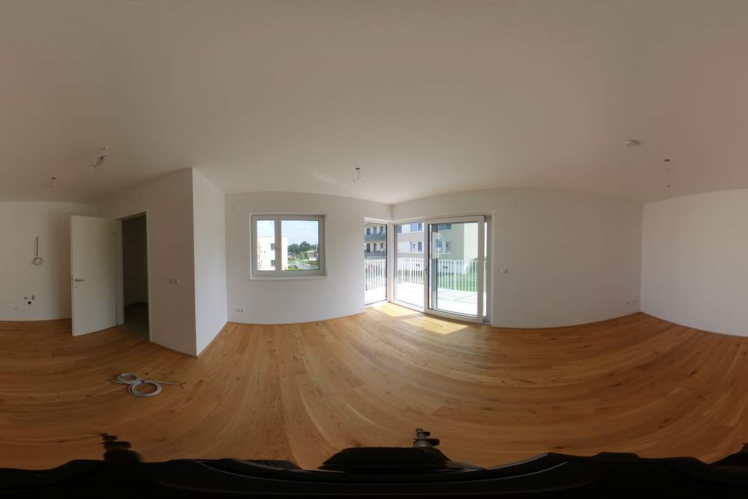 Vermietete Anlegerwohnung mit Garten – moderne Wohnqualität in ruhiger Lage