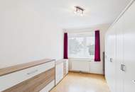 Großzügige 4 Zimmer Wohnung mit sonniger Südwest Loggia und Waldblick
