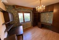 Baumgarten, Einfamilienhaus mit kleinem Garten