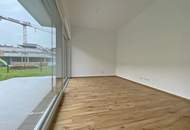 Topmoderne 2-Zimmerwohnung mit Eigengarten und Tiefgaragenstellplatz!
