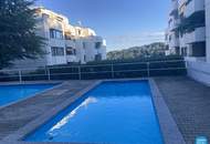 Erstbezug: Elegante Gartenwohnung mit Outdoor Pool