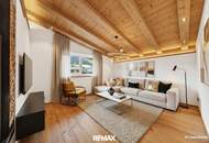 Mit dem Lift direkt in Ihr neues exklusives Penthouse mit Glaskamin und Traum Ausblick in Aurach bei Kitzbühel -